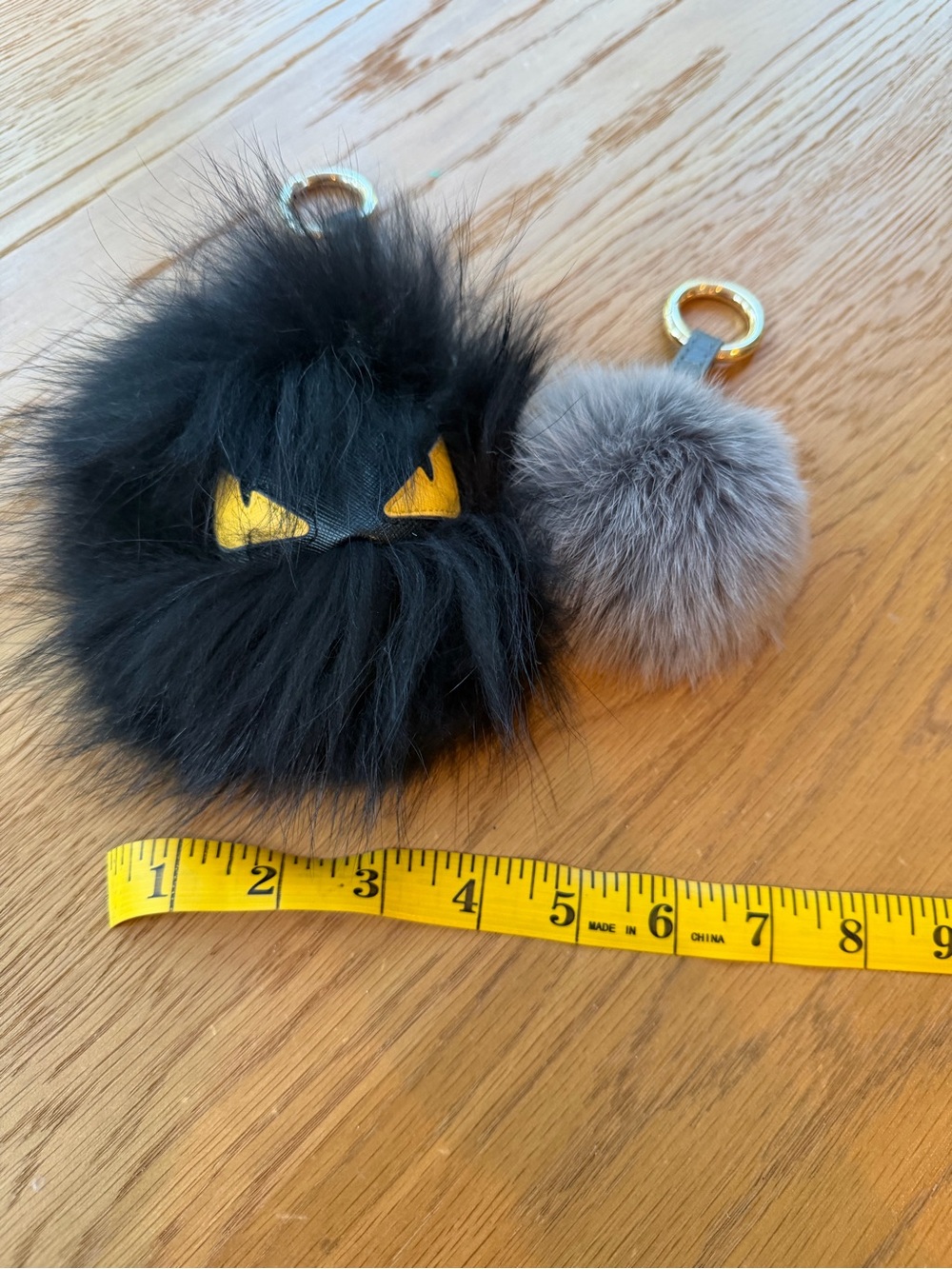 Black Faux Fur Monster Pom Keychain with Yellow Eye Accents - Picture 4 of 4